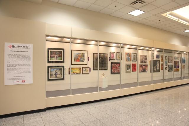 2nd Exhibit The artwork from the 2nd Annual NAP Exhibit at Hartsfield-Jackson International Aiport on display in the Gallery T Cases