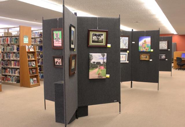 8th Annual Exhibit Display of artwork from the City of Lincoln employees and their families in the City Library.