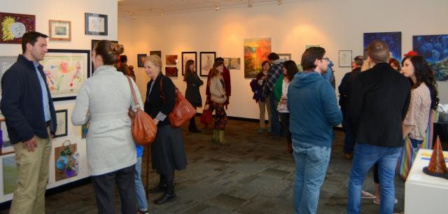 8th Annual Exhibit Visitors to the Downtown Art Center taking in the wonderful NAP artwork in display