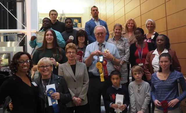 3rd Annual Exhibit 2015 Award Winners pose with presenters and judges at this year's reception.