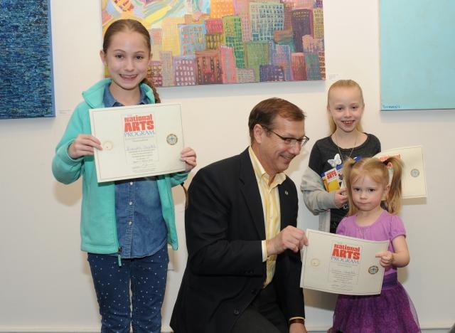 7th Annual Exhibit Stepecheck sisters receiving their certificates of participation from LexArts CEO Jim Clark