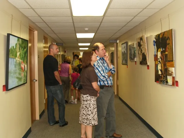 6th Annual Exhibit Attendees at the 2010 Awards Reception take in the art of Seminole County, FL