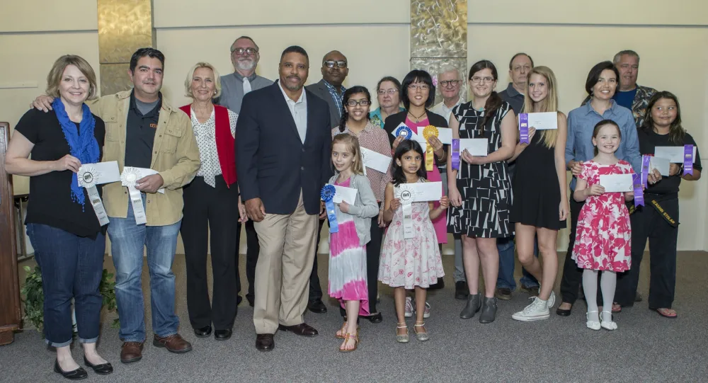 10th Annual Exhibit Award winners pose with Executive VP Kevin Buchanan at the awards reception at DFW