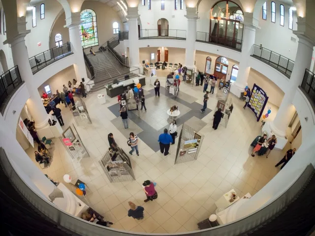 3rd Annual Exhibit View from above of the NAP exhibition on display in the lobby of the newly renovated Westside Multimodal Transit Center.