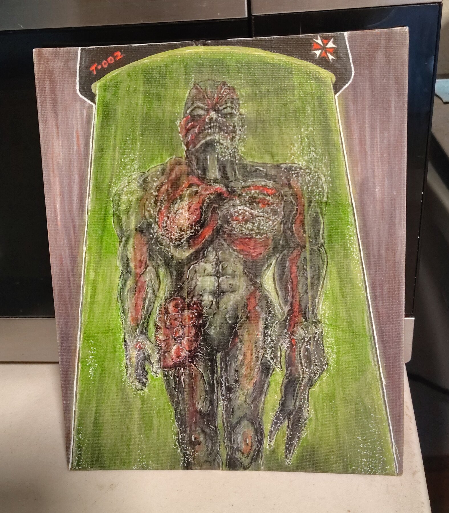 Tyrant from the first Resident Evil video game before he breaks out of the stasis tube 