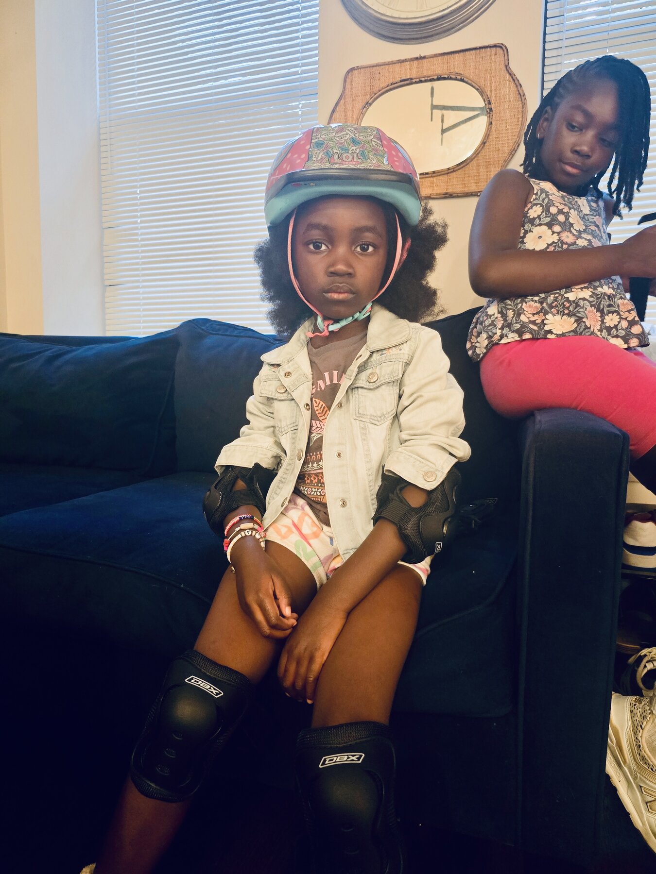 a younger sister is watched over by her older sister