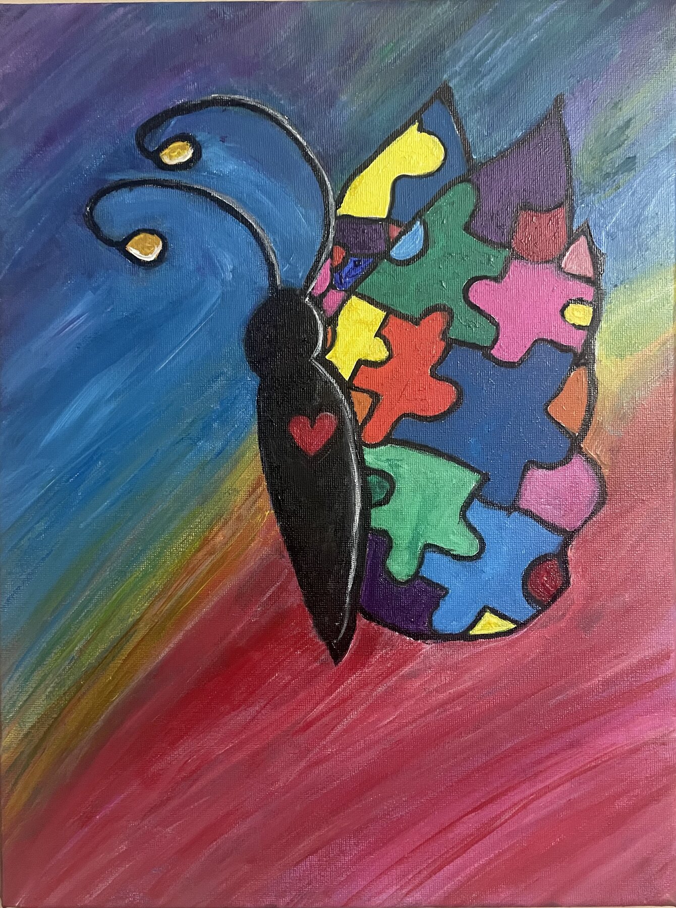 butterfly with multiple color puzzle pieces