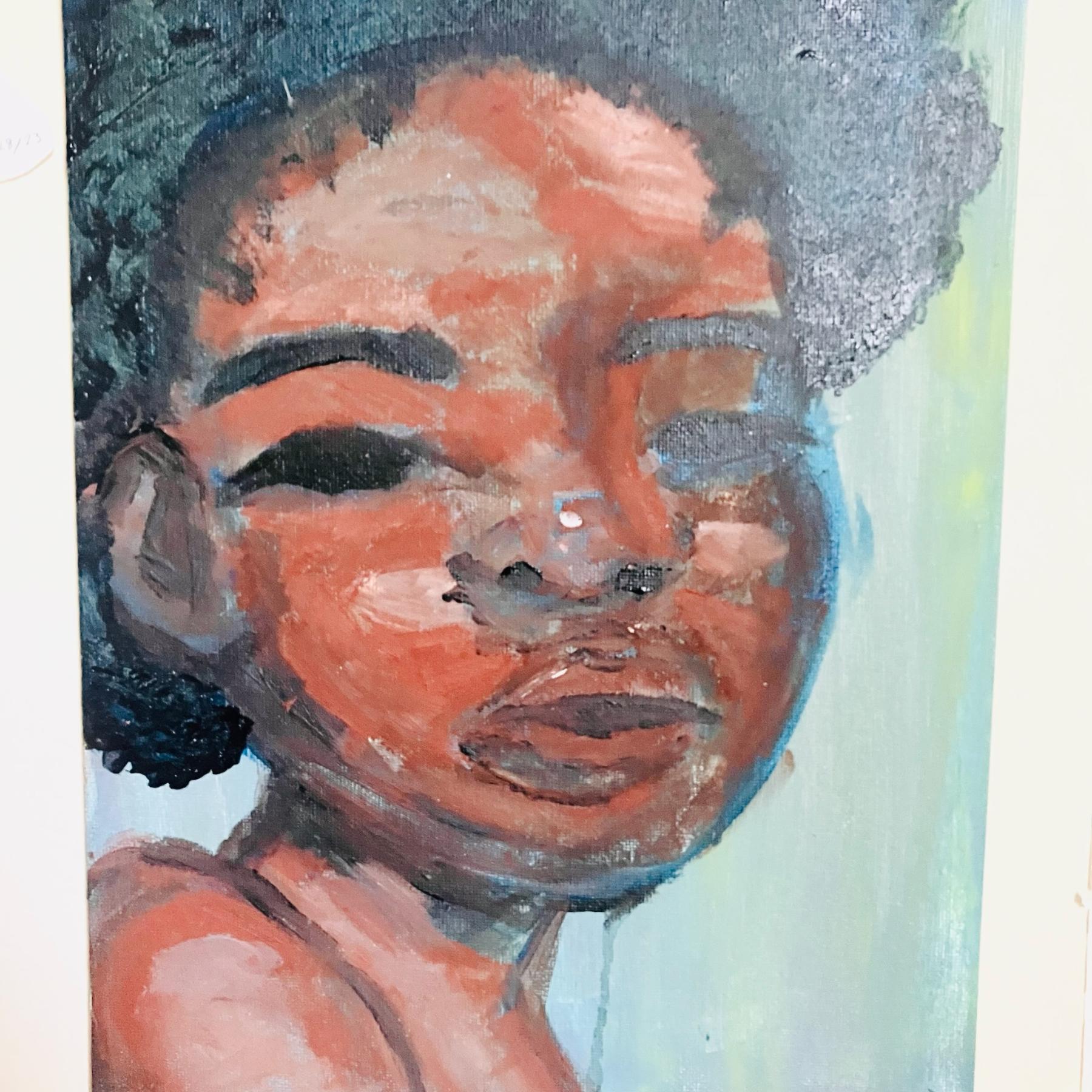 painted black woman with a curly afro