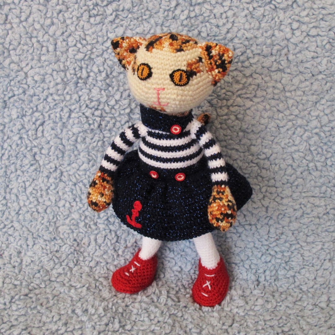 Poppy, calico cat in a sailor outfit; crochet doll on wire carcass with movable arms, legs and tail