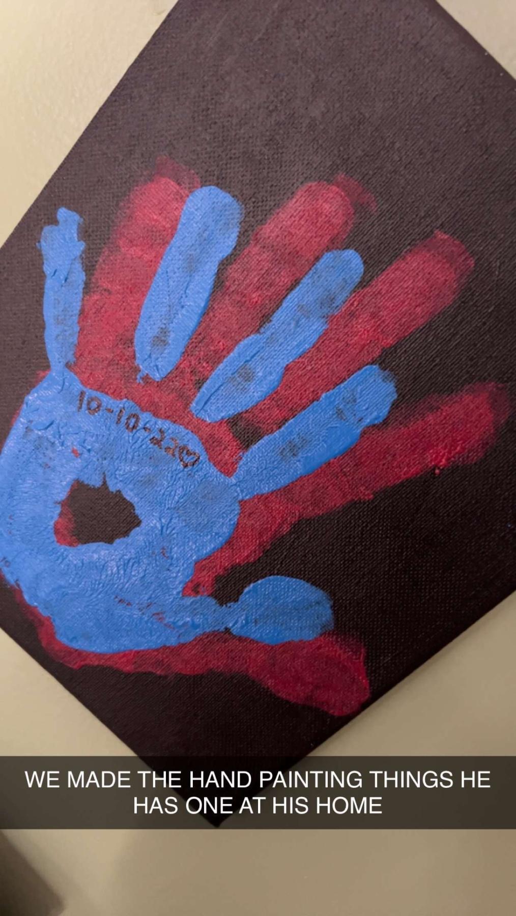 a blue hand surrounded by a red hand