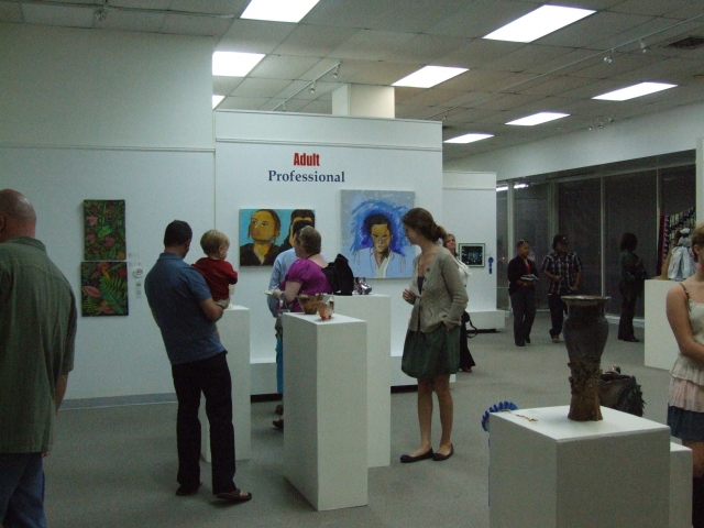 5th Annual Exhibit Attendees taking in the artwork at Opening Reception of the 5th Annual NAP Exhibition in Savannah, GA