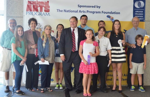 9th Annual Exhibit GOAA Executive Director, Phil Brown, with this year's award winners from Orlando International Airport's NAP awards reception
