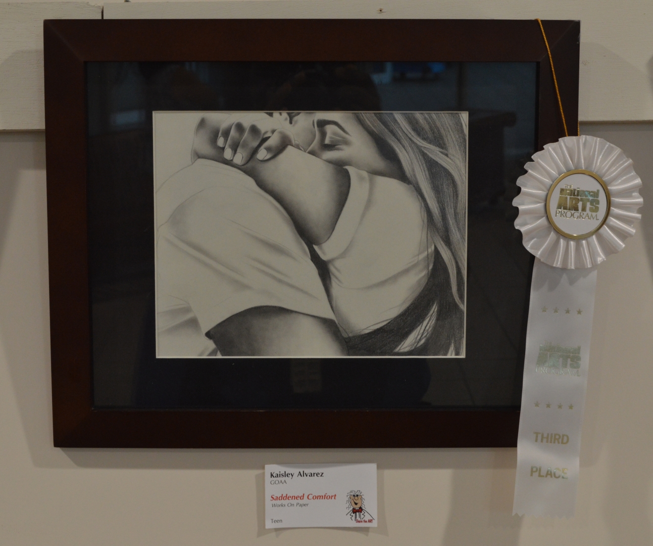 11th Annual Exhibit Saddened Comfort