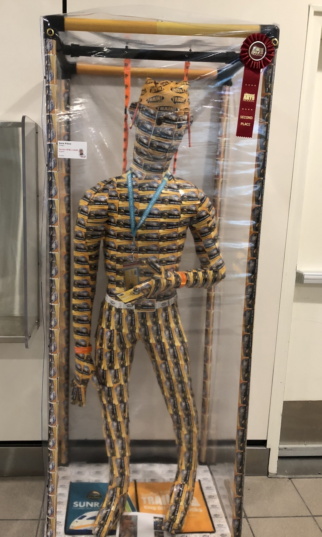 13th Annual Exhibit Service with a Smile