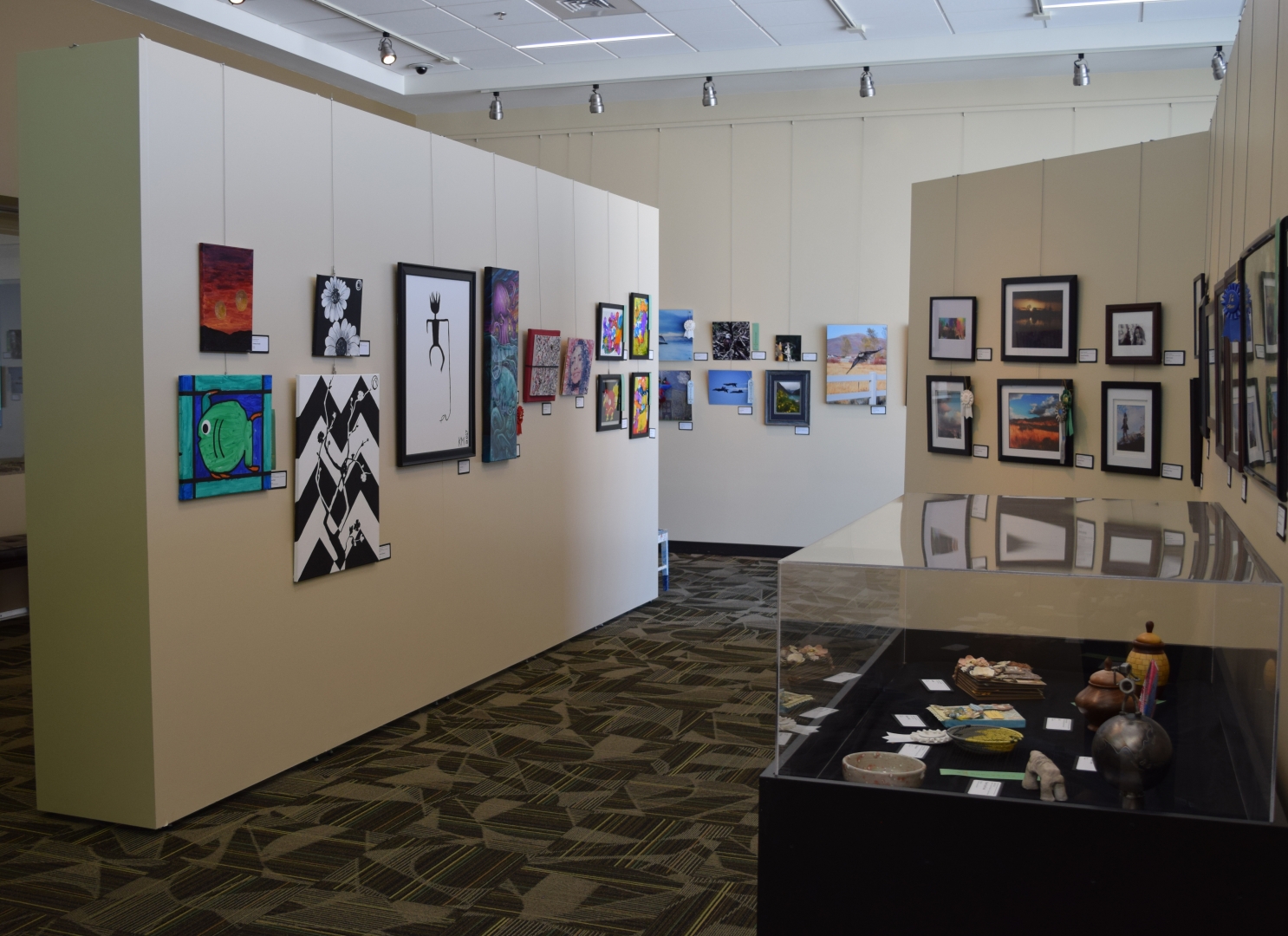 9th Annual Exhibit The DepARTures Gallery of Reno-Tahoe Airport beautifully displaying artwork from this year's exhibit.