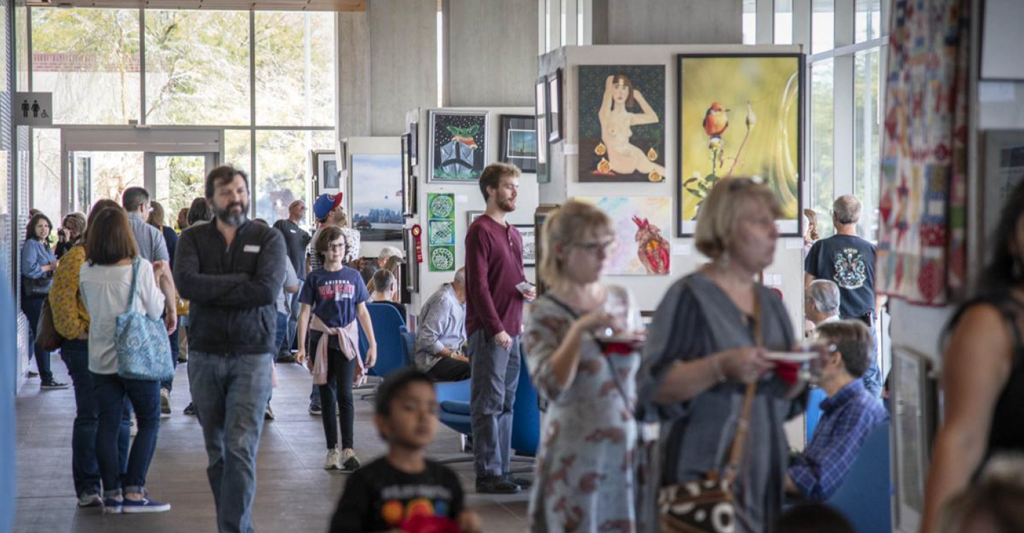 10th Annual Exhibit Attendees viewing the artwork during this year’s awards reception